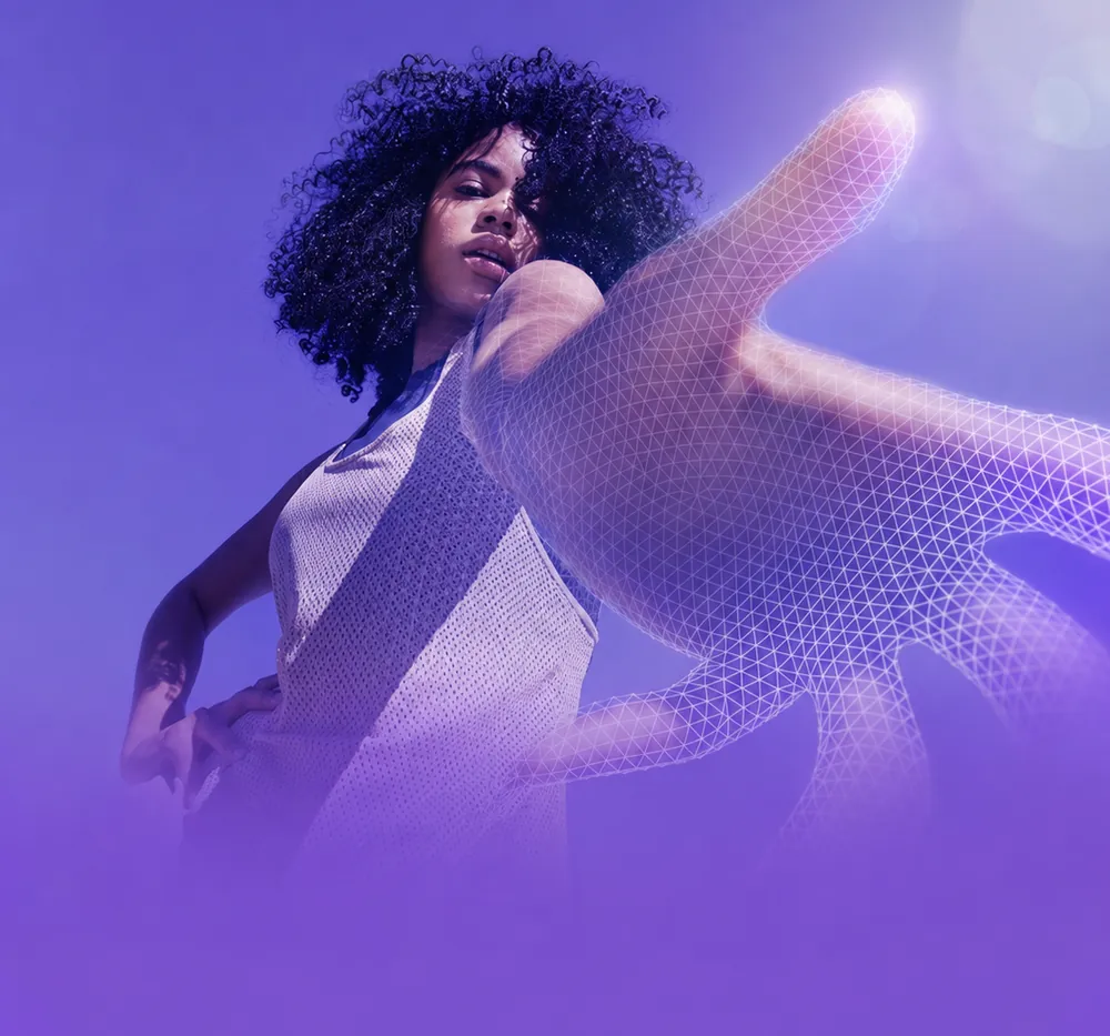 A colleague reaching towards the camera against a violet backdrop